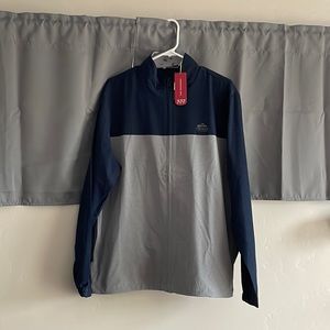 NWT golf jacket Corona Premier, by Travis Mathew.